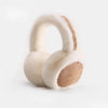 A pair of classic winter ear muffs with light beige fur and tan accents.