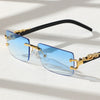 Trendy frameless rectangular sunglasses with light blue lenses and gold accents