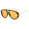Orange-tinted aviator style sunglasses with black frames and gold accents