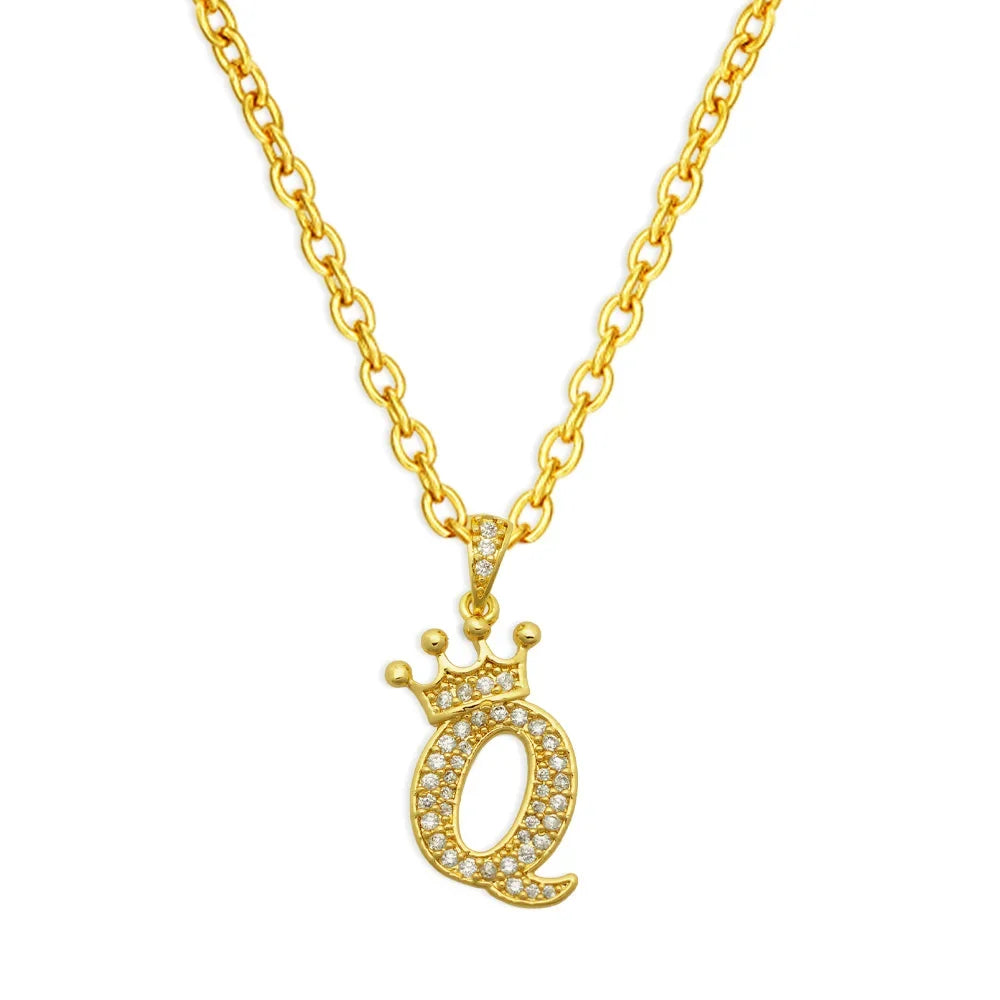 Gold initial name crown pendant necklace with a delicate chain