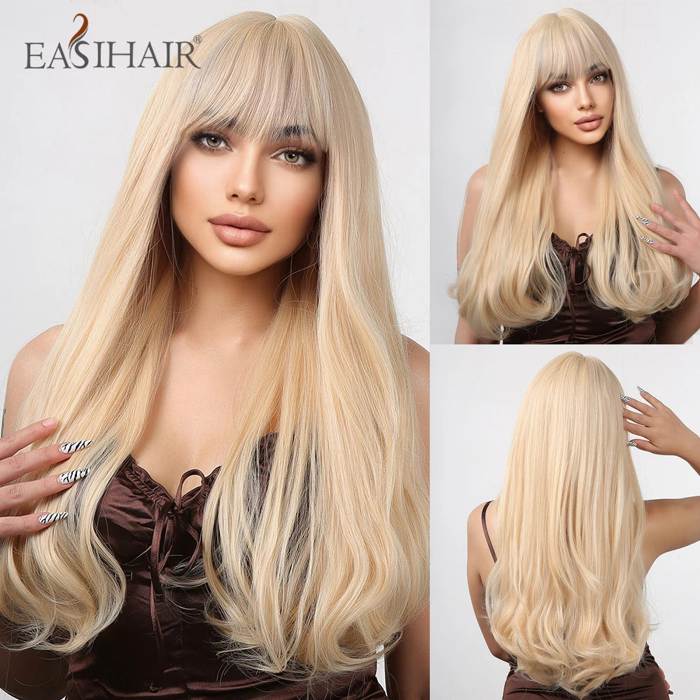 A model wearing a long, wavy sandy blonde wig with bangs and a brown top.