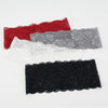 A collection of three floral lace hair headbands in red, gray, and black.