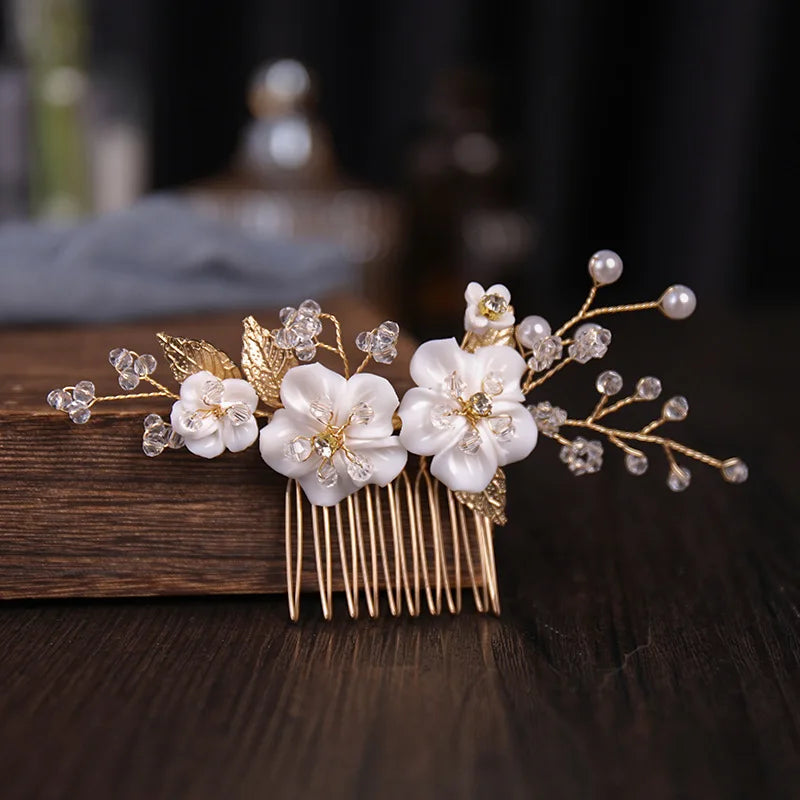 Golden leaf shaped pearl flower hairpin comb with white flowers and clear beads