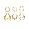 A set of six gold-toned faux septum and nose rings with diamond accents.