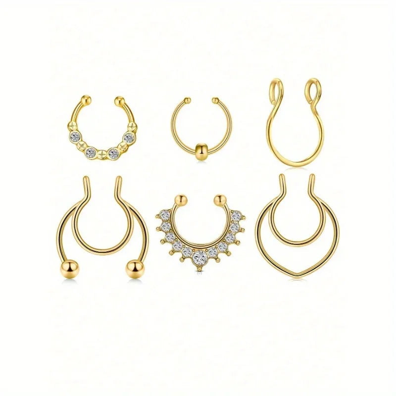 A set of six gold-toned faux septum and nose rings with diamond accents.