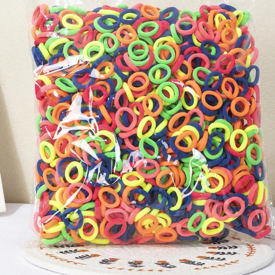 A plastic bag filled with colorful nylon elastic hair cords for kids headbands