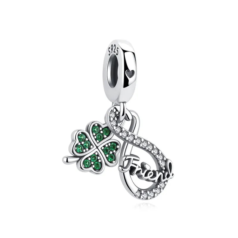 A silver 925 sterling silver family tree charm necklace with a heart pendant.