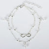 A delicate silver-plated friendship anklet featuring a chain and an infinity symbol charm.