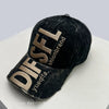 A black baseball cap embroidered with gold letters DIFSL and Yueqfa on a white surface.