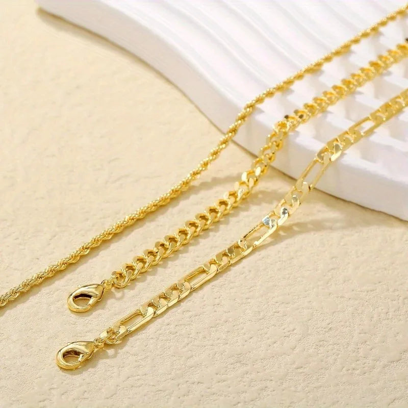 Gold flat snake chain anklets set displayed on a light background.