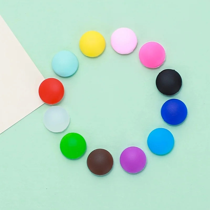 A circular arrangement of colorful silicone eyeglass grips in various shades including yellow, pink, red, blue, and green.