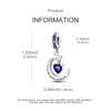 Sterling silver moon charm pendant with a crescent shape and a blue gemstone