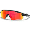 Orange-tinted cycling sunglasses with a black frame shown against a white background.