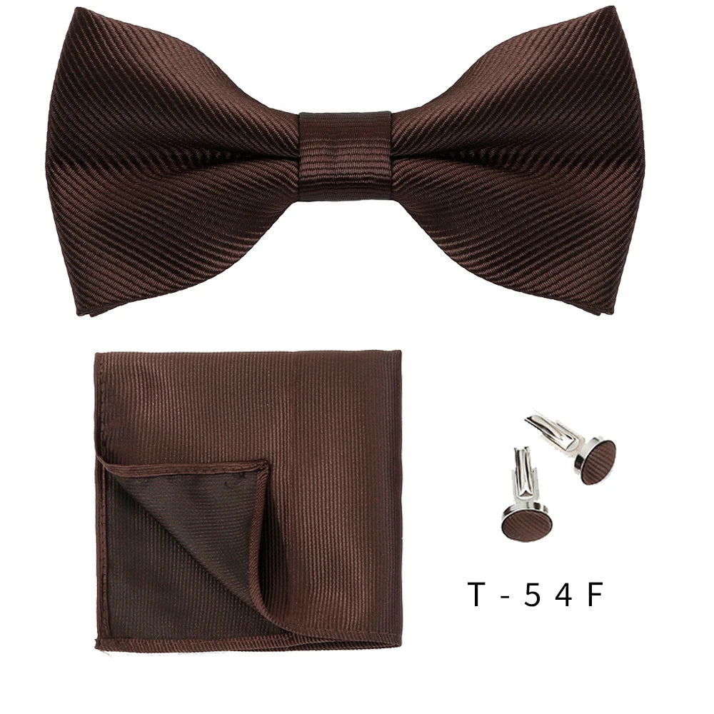 A dark brown men's bow tie and cufflink set displayed against a white background.