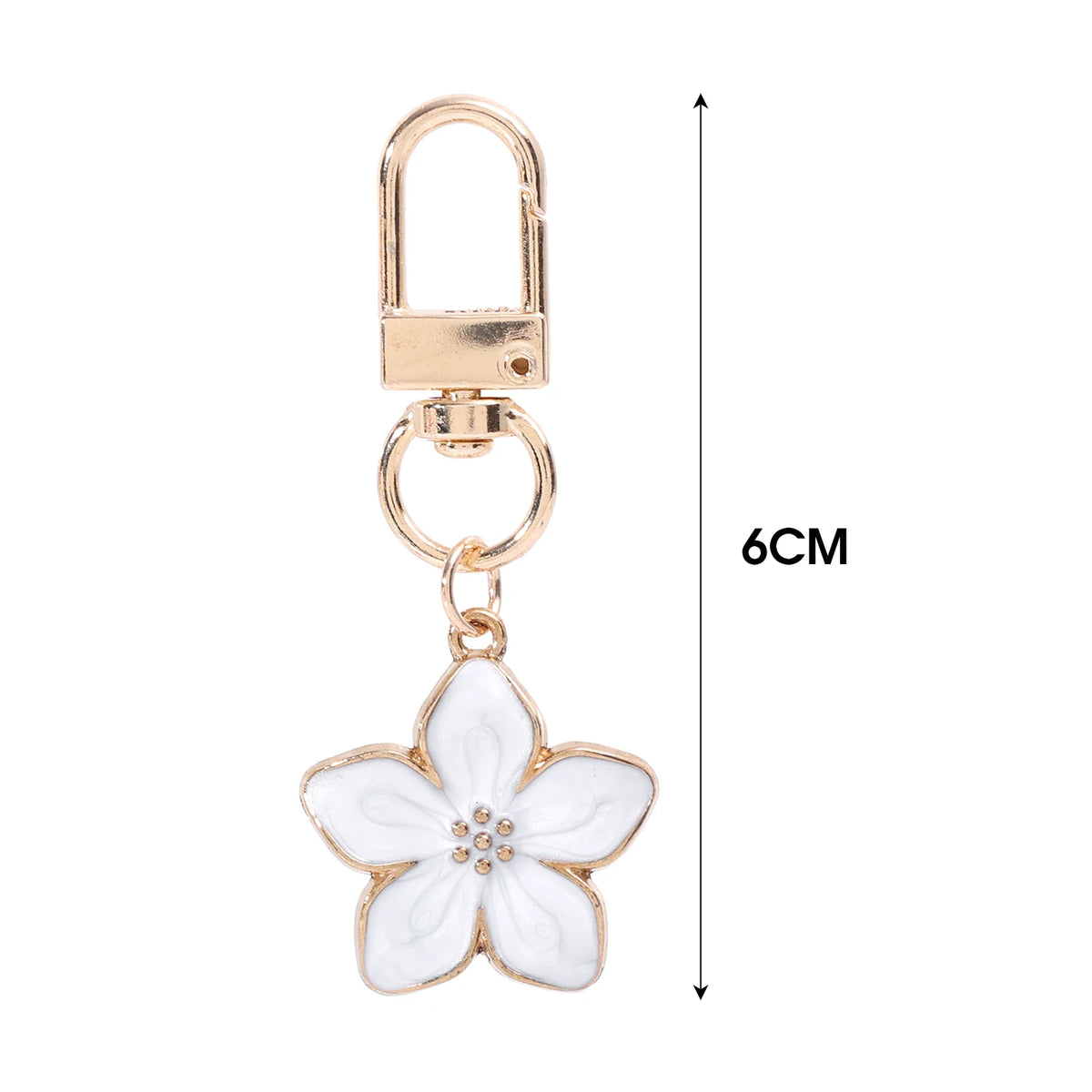 Llavero floral dorado con gancho de candado y dije de flor blanca