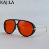Un par de gafas de piloto vintage grandes con lentes naranja brillante y montura negra.
