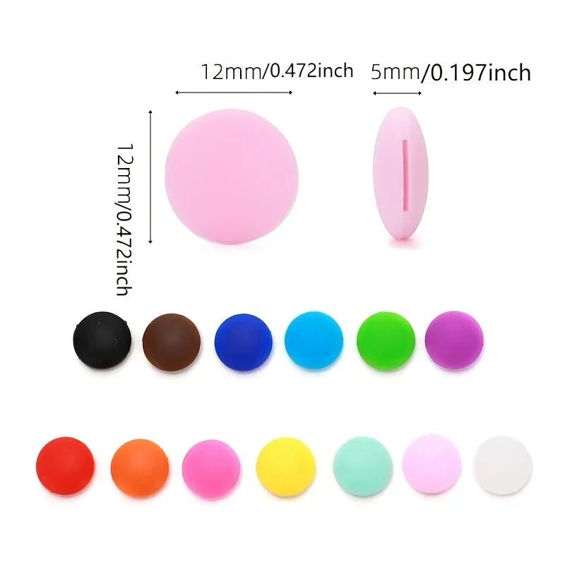 A collection of pink and colored silicone eyeglass grips in various shapes and sizes.