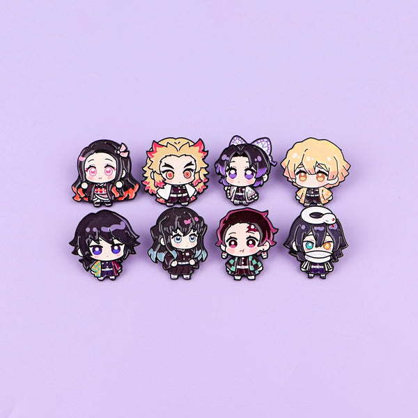 A set of eight cute enamel cartoon brooches featuring various stylized characters and hair colors on a light purple backgroun