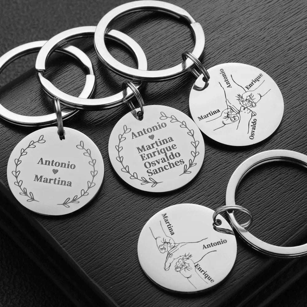 Silver stainless steel keychain with engraved names and floral designs for a family