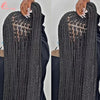 Close-up of a black full lace box braids wig being held by hands.