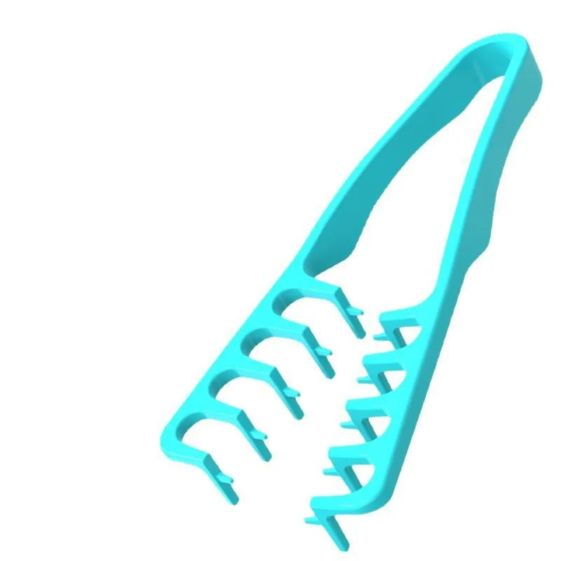 A turquoise volume boosting detangling hair comb shown from the side.