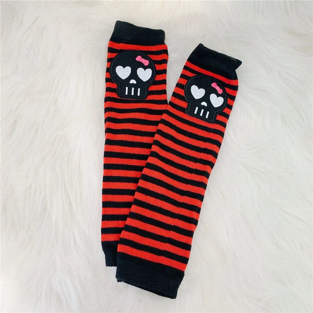 Black and red striped fingerless socks featuring a skull design with pink hearts