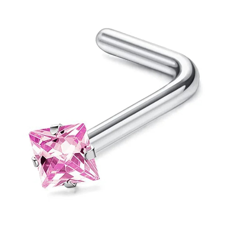 Surgical stainless steel nose piercing studs with a polished silver bar and a pink gemstone head.