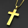 A gold-tone stainless steel cross pendant necklace with rhinestone accents displayed against a dark background.
