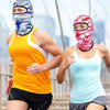 Two people running outdoors wearing colorful balaclava caps and athletic tops.
