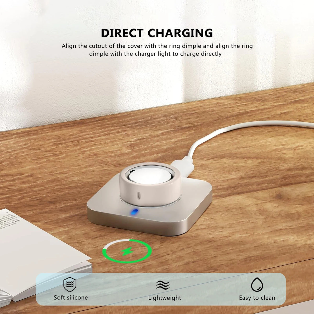 A white silicone ring protector device is shown on a wooden table with instructions for direct charging.