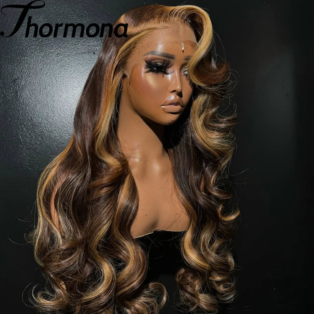 A model wearing a long, wavy brown and honey blonde ombre wig with lace front.