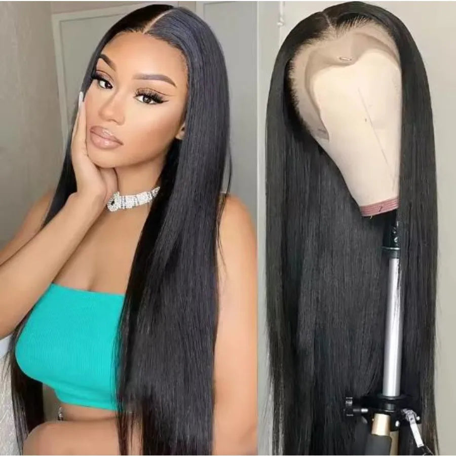 A woman models a long, straight black lace front wig with a natural black hairline and blonde roots.