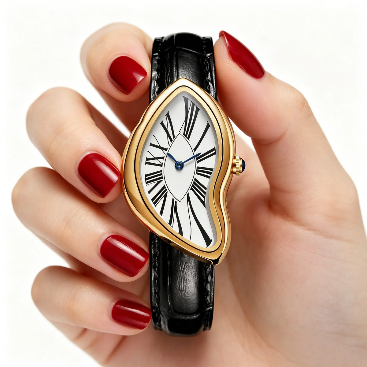 A hand holds a gold-toned quartz watch with an irregular, heart-shaped face and black strap.
