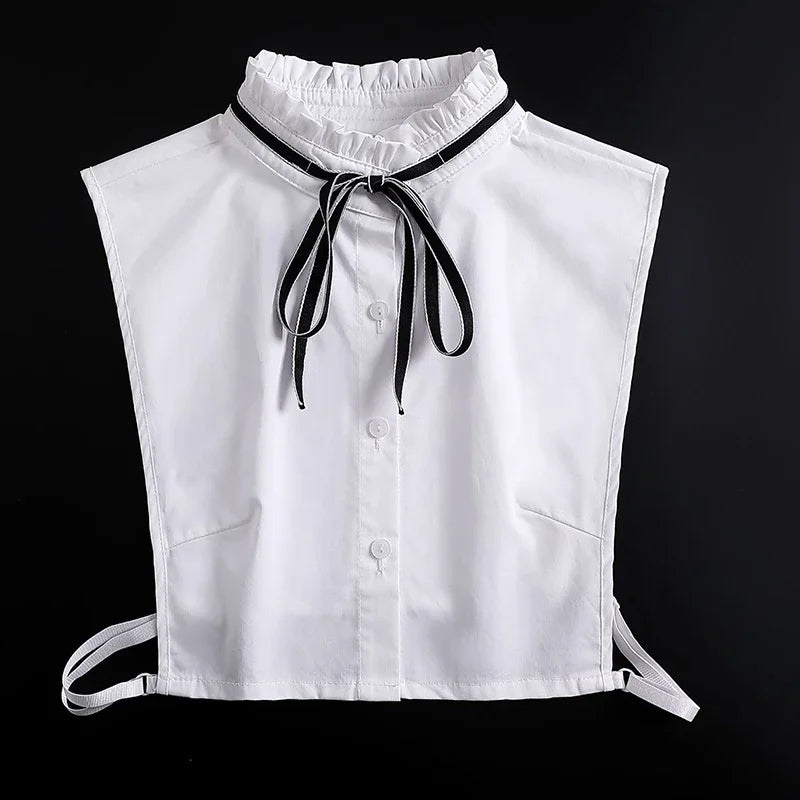 White blouse with a fashionable false collar and tie-up neck detail