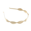 A delicate gold leaf headband for bridal or party wear.