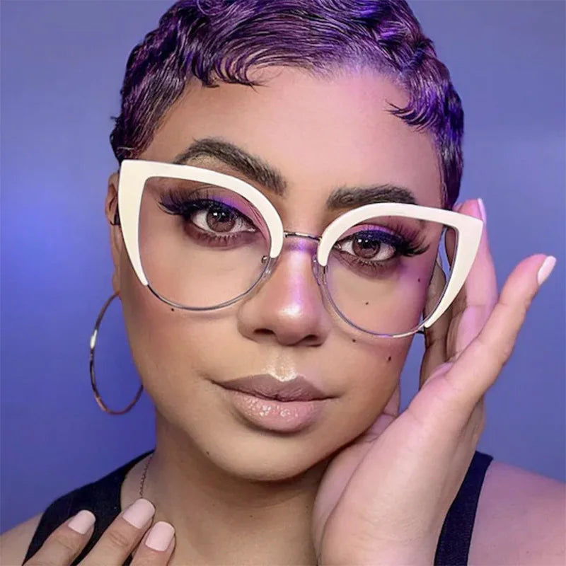 A close-up portrait of a woman wearing vintage metal cat eye anti-blue light eyeglasses.