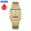 A gold-toned Casio GUA ITZ wristwatch with a metal bracelet and a round face.