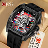 A black luxury wine barrel quartz watch with a dark face and textured strap is displayed on a light background.
