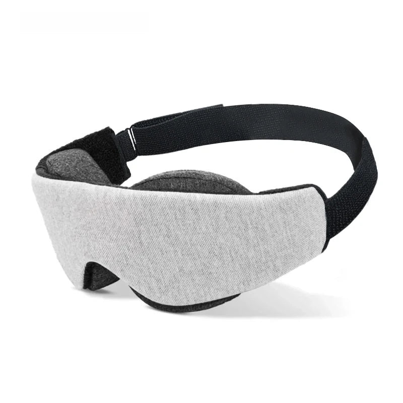 A grey and black 3D contoured sleep mask designed for deep rest.