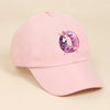 A pink baseball cap featuring a rainbow unicorn design on the front.