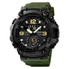 Montre sportive numérique vert foncé avec boîtier noir et accents dorés, affichant 12:56:43.