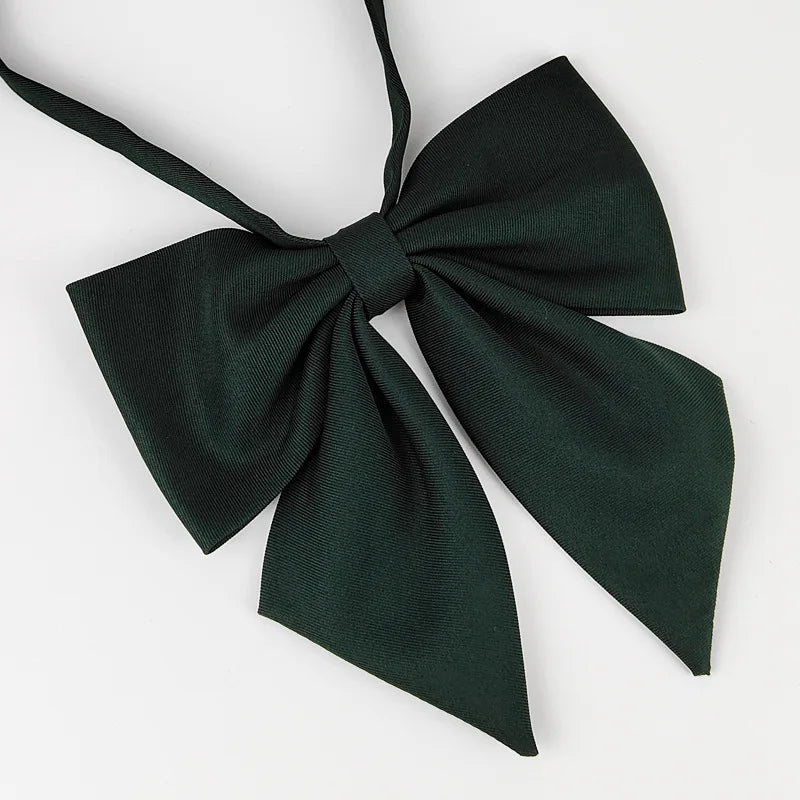 A dark green bow tie made of fabric, suitable for a classic butterfly ribbon set.