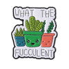 Enamel lapel pin featuring text that reads What the Succulent