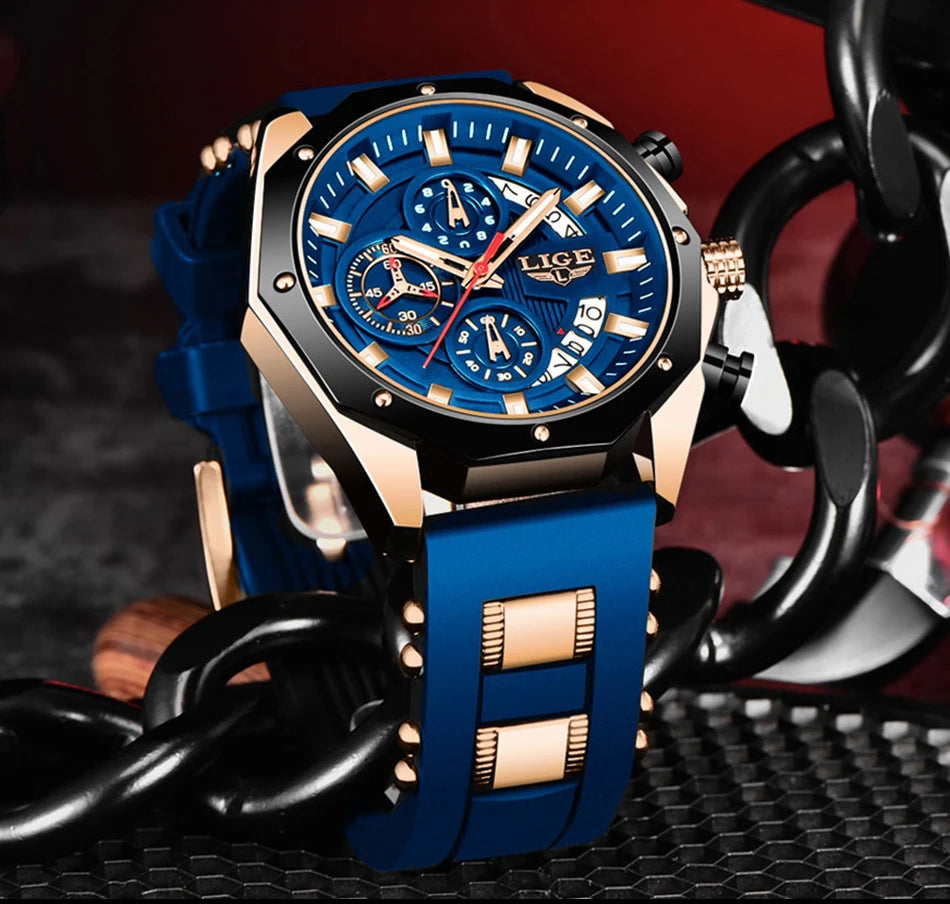 A blue and gold men's luxury quartz sport watch with a chronograph is displayed on a black strap.
