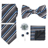 A set of men's formal tie and accessory featuring a striped tie, bow tie, and pocket square.