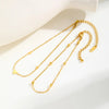 Gold stainless steel heart double chain anklet set displayed on a white background