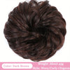 Dunkelbraunes gewelltes lockiges Chignon-Haar mit Bändern