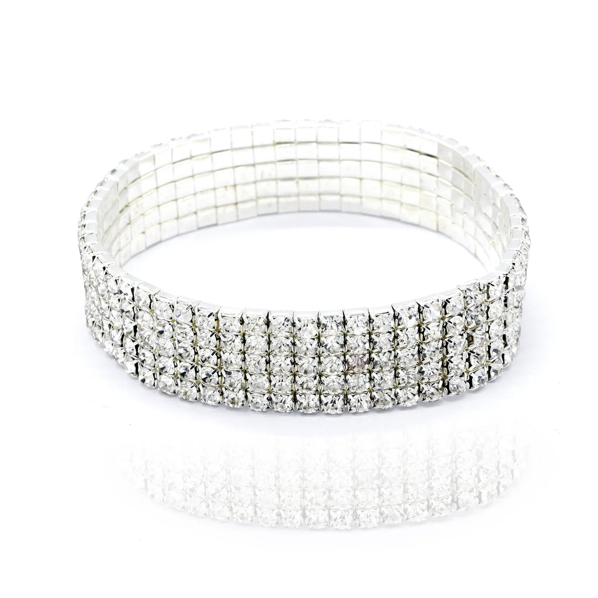 A stack of multi-layer crystal tennis anklets for women, sparkling silver color.