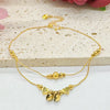 Gold-plated heart bell anklet for women displayed on a light background.