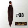A bundle of dark brown pre-stretched Kanekalon braiding hair extensions labeled #33 with a hot water setting.